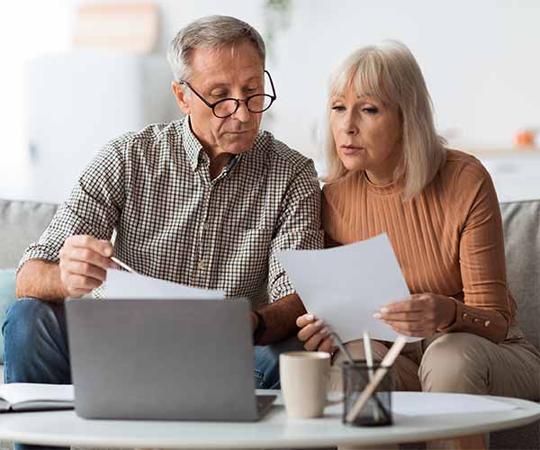 Couple looking at bill